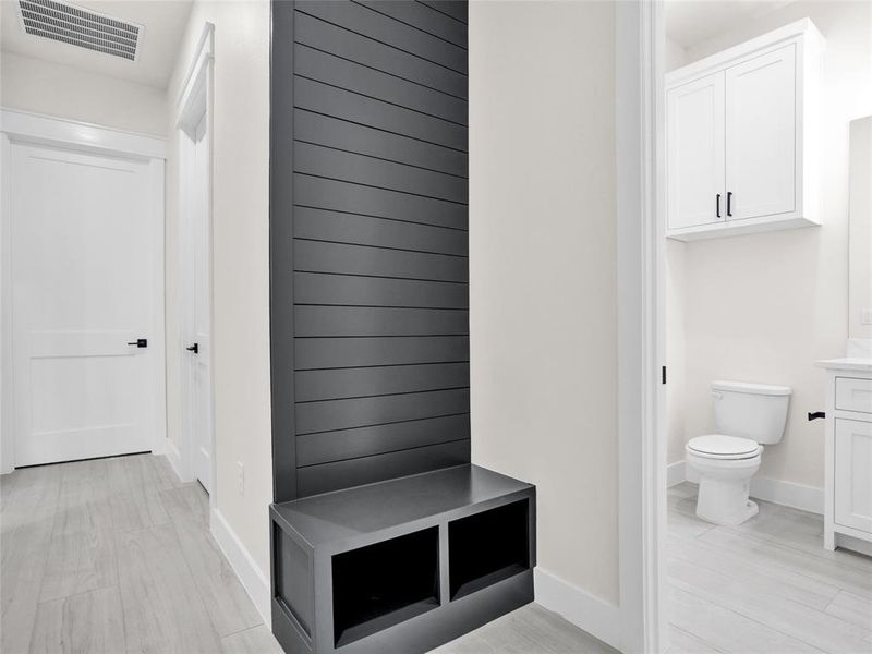 Mudroom 1 of 2 located by garage entrance.