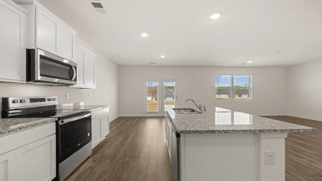 Furnished interior view inside a new home in Champion's Run, Lithonia (Image 6).