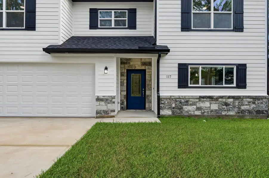 Exterior details and patio area of a home in , Conroe (Image 3). Exterior details and patio area of a home in , Conroe (Image 3).