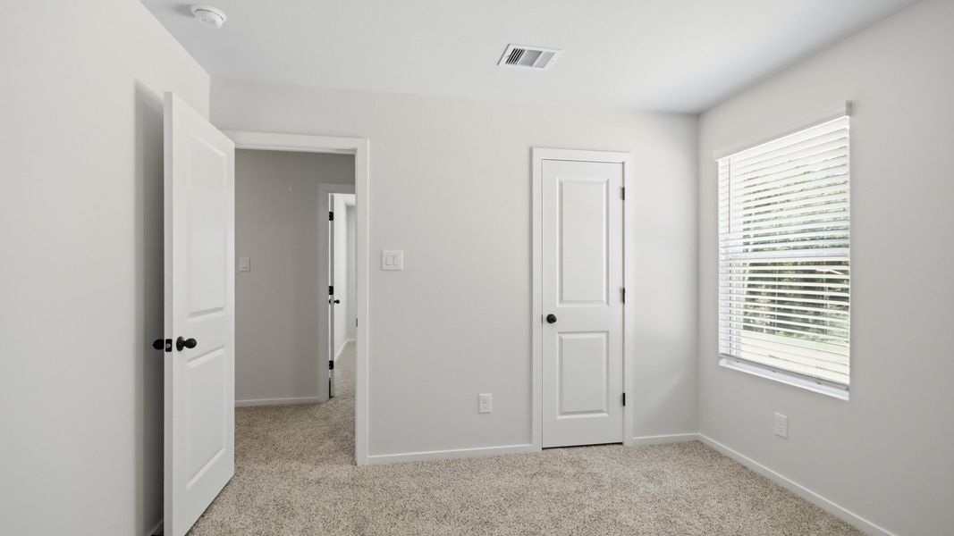 Representative unfurnished interior of a home built from the Perry by D.R. Horton in New Waverly Station, New Waverly (Image 20).
