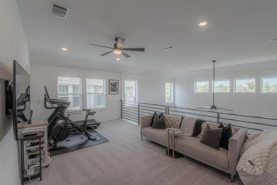 A versatile second living area provides additional space for a game room, media lounge, or gym.