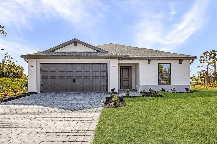Front exterior of a new home in Port Charlotte, North Port, FL, highlighting curb appeal (Image 1). Front exterior of a new home in Port Charlotte, North Port, FL, highlighting curb appeal (Image 1).
