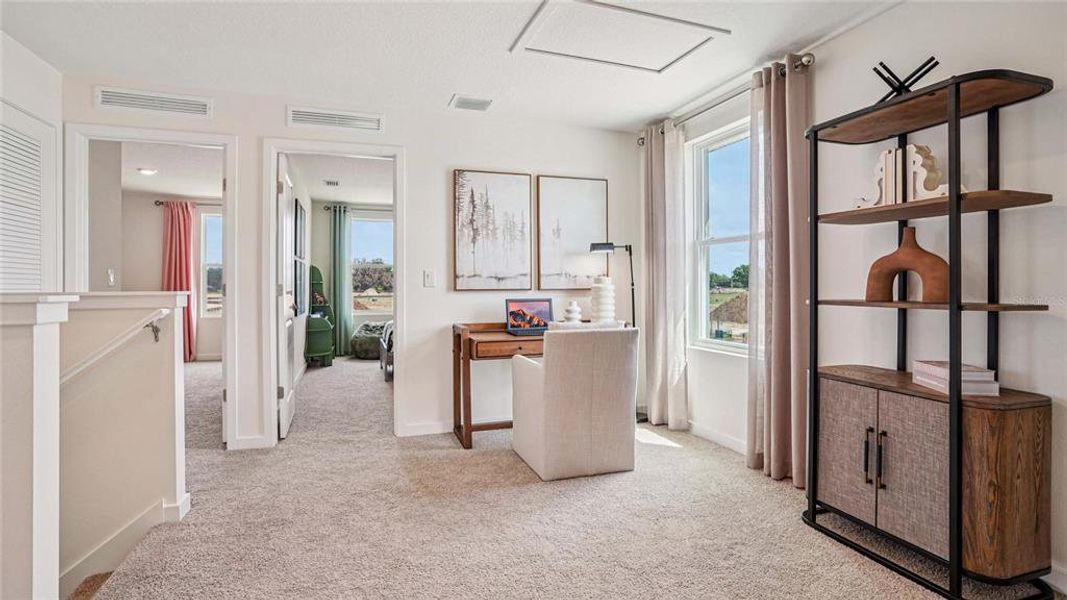 Furnished interior view inside a new home in Twisted Oaks, Wildwood (Image 5).