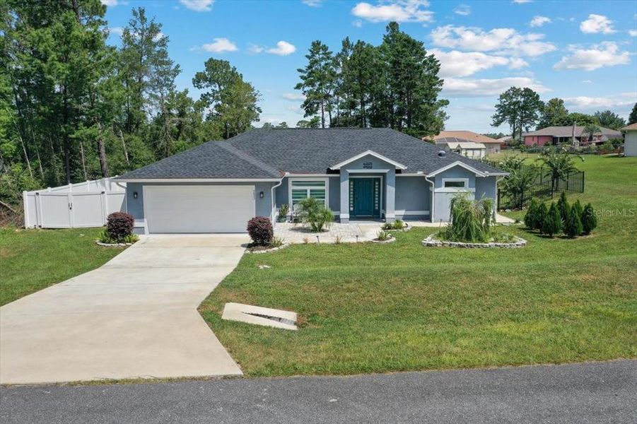 Front exterior of a new home in , Ocala, FL, highlighting curb appeal (Image 30). Front exterior of a new home in , Ocala, FL, highlighting curb appeal (Image 30).