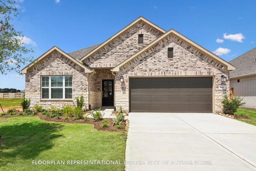 Front exterior of a new home in Hallimore Ranch, Rosenberg, TX, highlighting curb appeal (Image 2). Front exterior of a new home in Hallimore Ranch, Rosenberg, TX, highlighting curb appeal (Image 2).