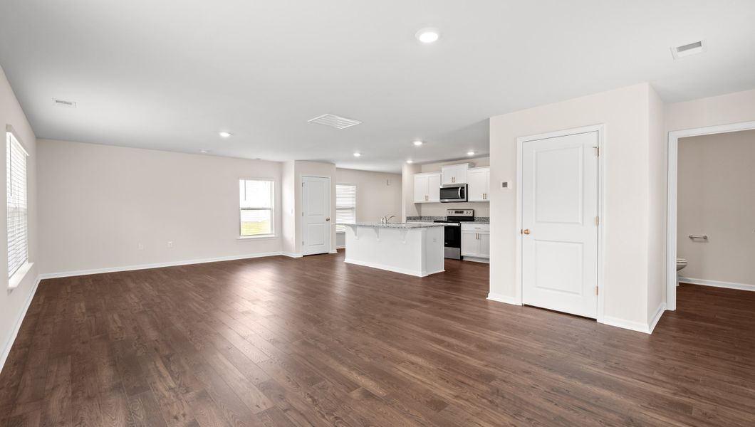 Representative unfurnished interior of a home built from the ELSTON by D.R. Horton in Harrier Point, Woodruff (Image 14).