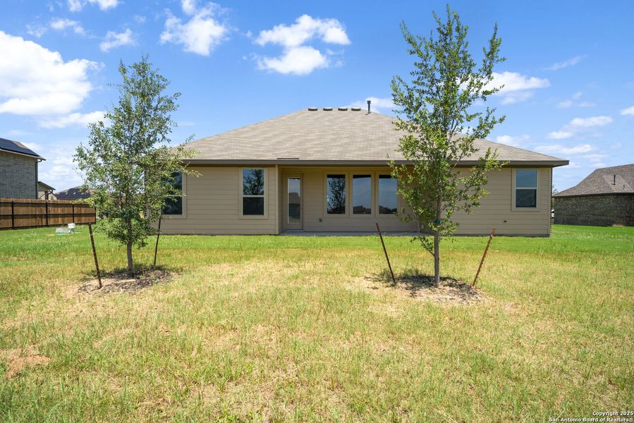 Front exterior of a new home in Annabelle Ranch, San Antonio, TX, highlighting curb appeal (Image 2). Front exterior of a new home in Annabelle Ranch, San Antonio, TX, highlighting curb appeal (Image 2).