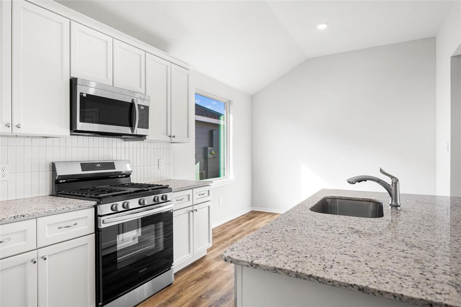 Furnished interior view inside a new home in Hill & Dale Ranch, Splendora (Image 11).