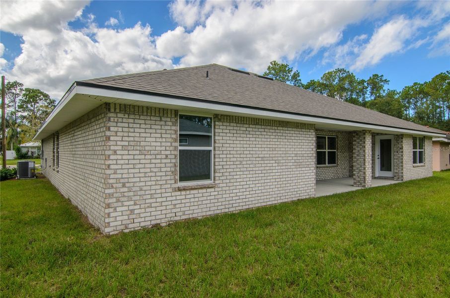 Exterior details and patio area of a home in Palm Coast, Palm Coast (Image 21).