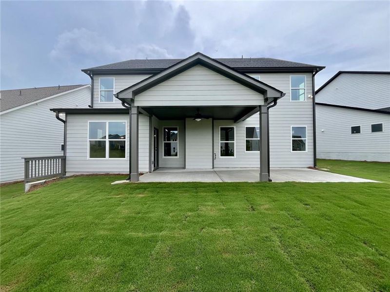 Exterior details and patio area of a home in Twin Lakes, Hoschton (Image 3).
