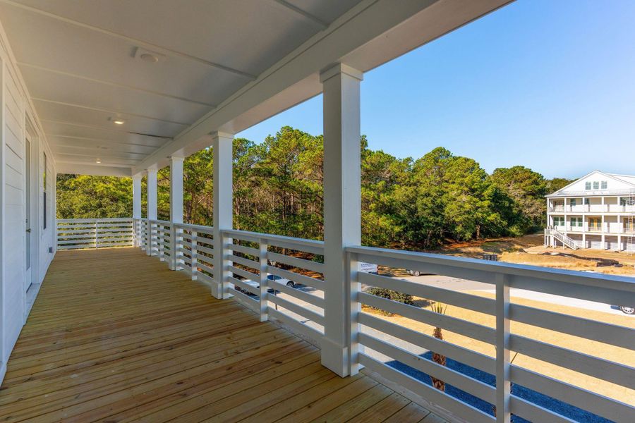 Exterior details and patio area of a home in Overlook at Copahee Sound, Awendaw (Image 31).