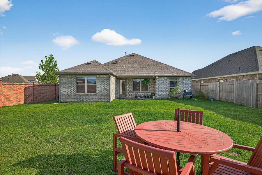 Exterior details and patio area of a home in Sunterra, Katy (Image 4). Exterior details and patio area of a home in Sunterra, Katy (Image 4).