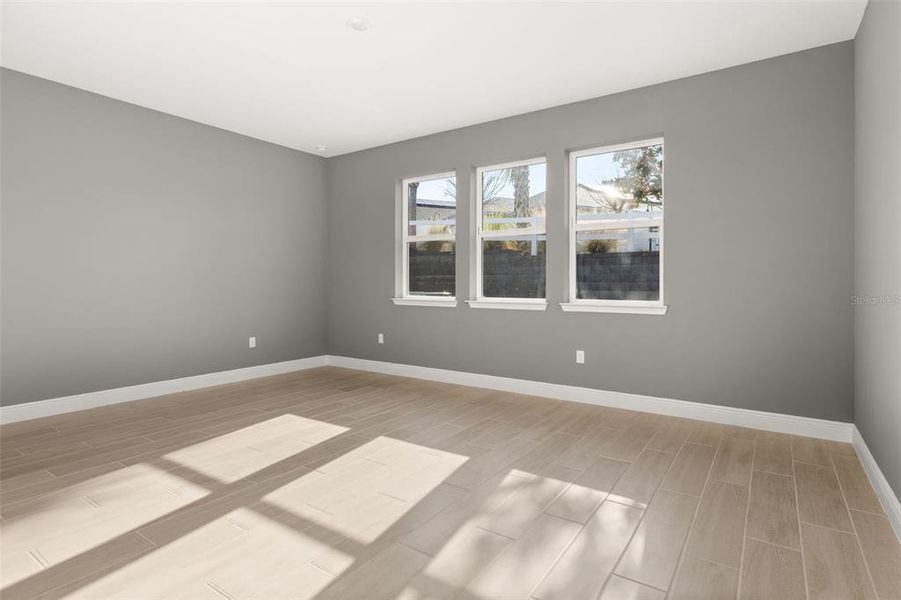 Spacious, unfurnished interior of a new home in Green Key Village, Lady Lake (Image 12).