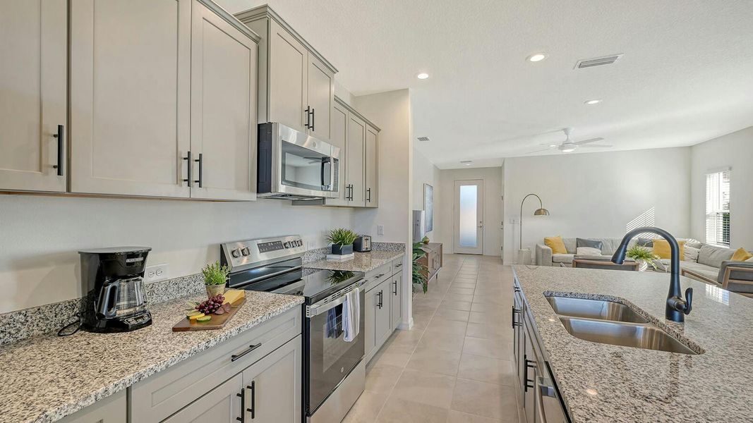 Furnished interior view inside a new home in Grand Park Real Estate and Homes for Sale in Sarasota, FL - Neal Communities, Sarasota (Image 17).