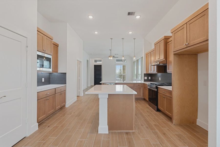 Representative furnished interior of a home built from the Torrey Pines by Chesmar Homes in Riceland Alley Loads, Mont Belvieu (Image 7).