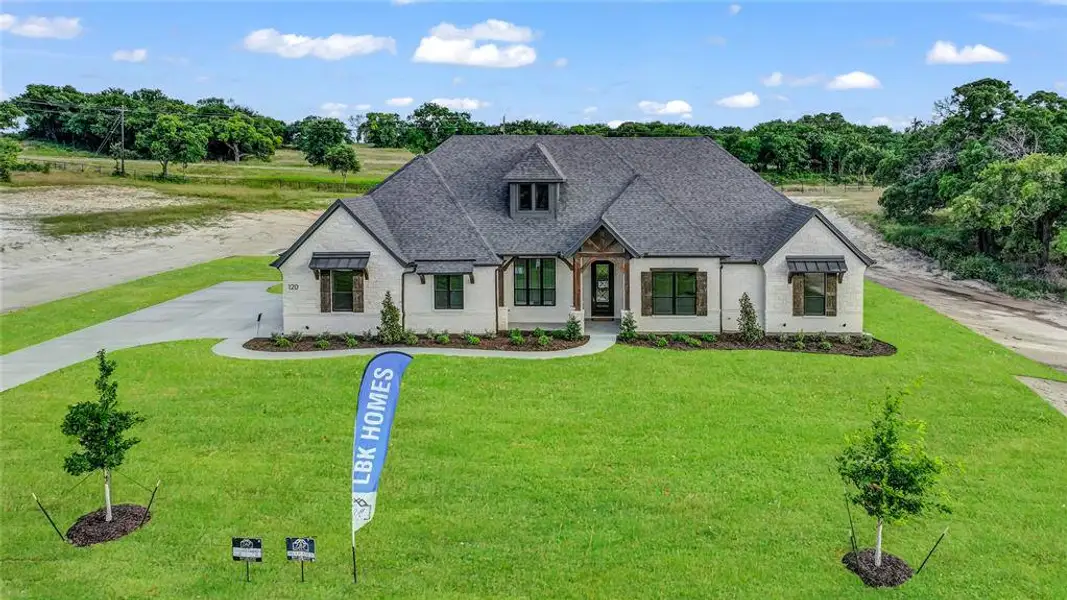 Front exterior of a new home in , Decatur, TX, highlighting curb appeal (Image 27).