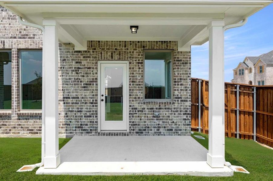 Exterior details and patio area of a home in Brookshire at Legacy Hills, Celina (Image 4).