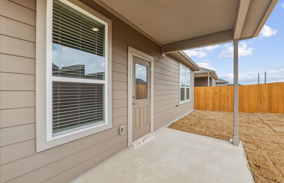 Exterior details and patio area of a home in Crosswinds, Kyle (Image 23).