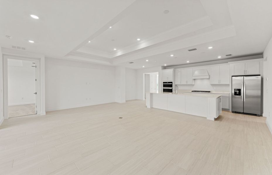 Spacious, unfurnished interior of a new home in Del Webb Oak Creek, North Fort Myers (Image 11).