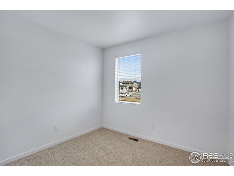 Spacious, unfurnished interior of a new home in Hansen Farm, Fort Collins (Image 23).