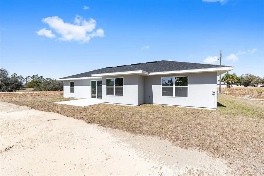 Exterior details and patio area of a home in , Ocala (Image 4).