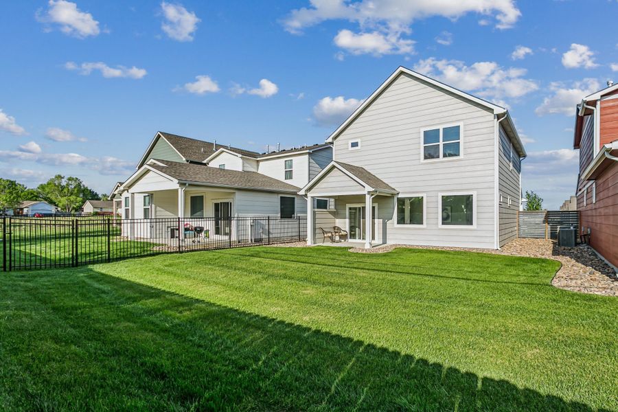 Exterior details and patio area of a home in Heritage Commons, Andover (Image 20).