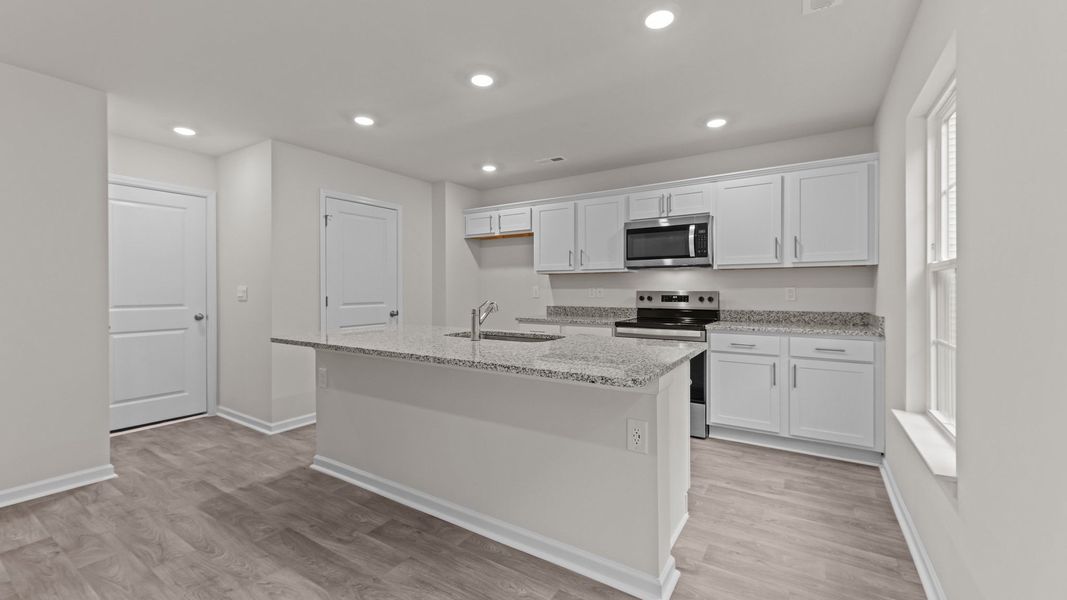 Furnished interior view inside a new home in Blair Ridge, La Grange (Image 5).