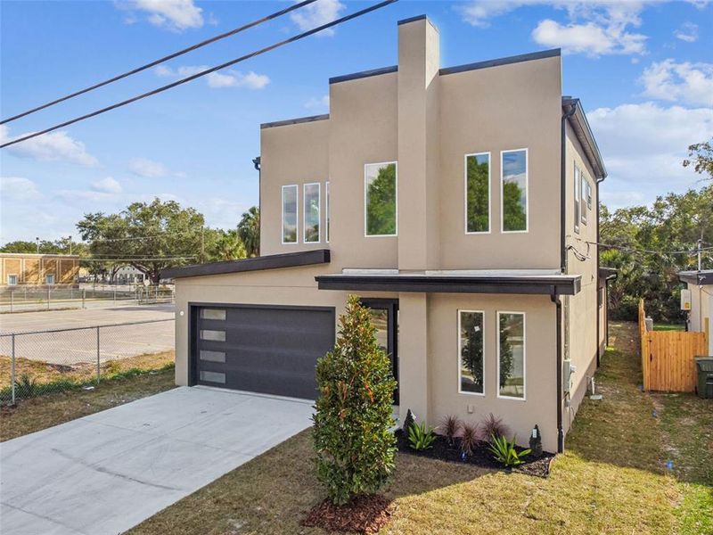 Front exterior of a new home in , Tampa, FL, highlighting curb appeal (Image 35).