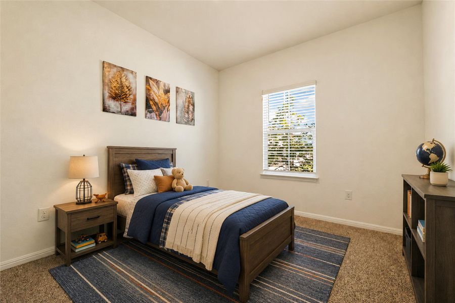 Virtually staged - Bedroom #2 features plush carpeting and a large window providing pleasant outdoor views.