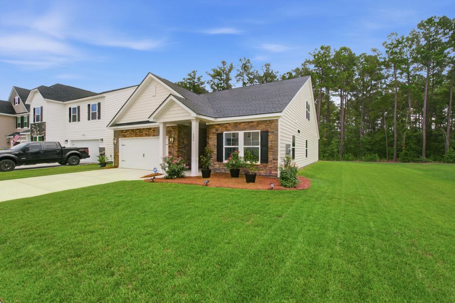 Front exterior of a new home in , Moncks Corner, SC, highlighting curb appeal (Image 28). Front exterior of a new home in , Moncks Corner, SC, highlighting curb appeal (Image 28).