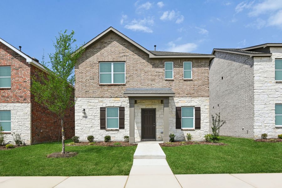 Representative exterior photo of a completed home built from the Pluto by Starlight Homes in Brookshire at Legacy Hills, Celina, TX (Image 1). Representative exterior photo of a completed home built from the Pluto by Starlight Homes in Brookshire at Legacy Hills, Celina, TX (Image 1).