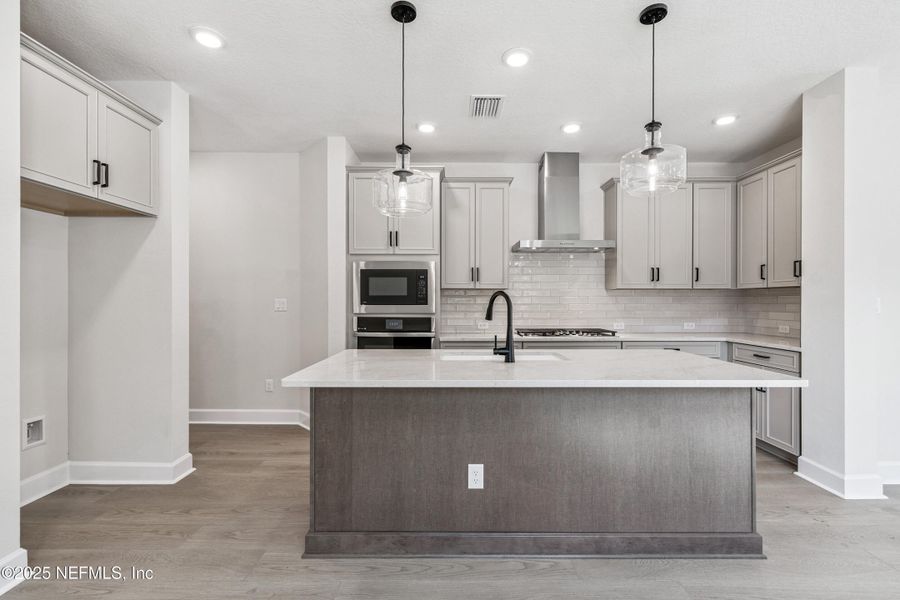 Furnished interior view inside a new home in Evergreen Island at Silverleaf - Classic, St. Augustine (Image 2). Furnished interior view inside a new home in Evergreen Island at Silverleaf - Classic, St. Augustine (Image 2).
