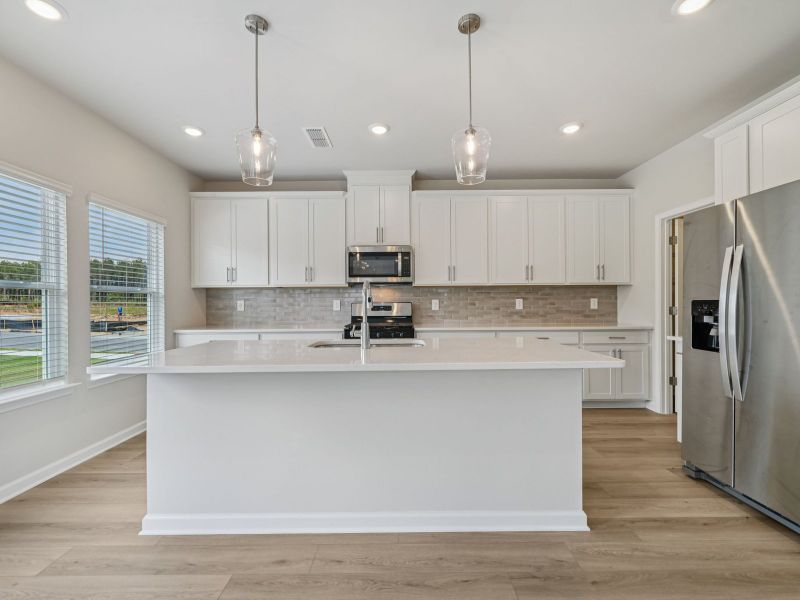 Furnished interior view inside a new home in Northwoods at Mirror Lake, Villa Rica (Image 5).