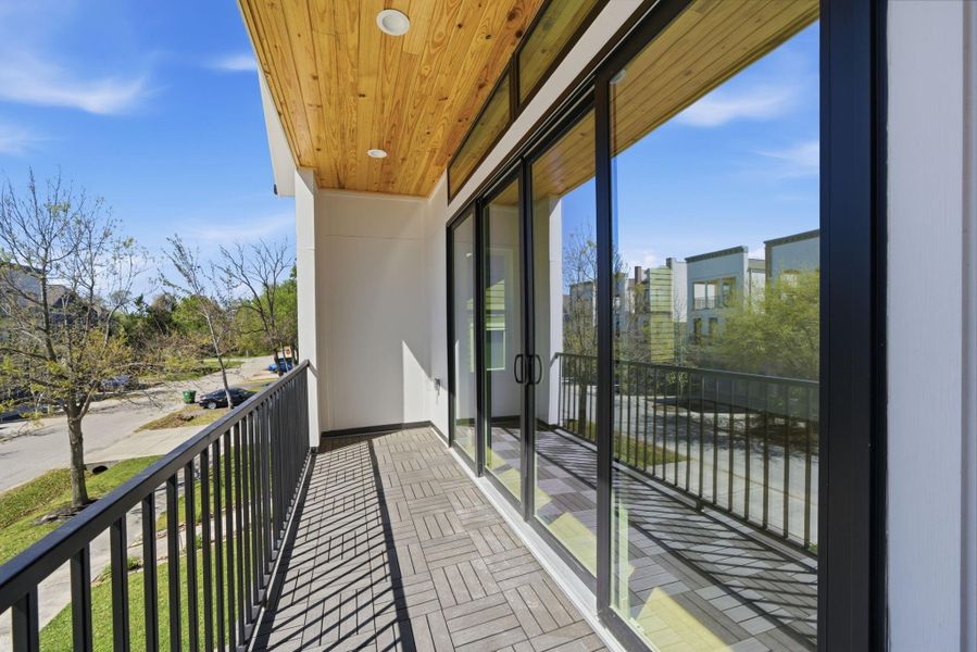 Exterior details and patio area of a home in , Houston (Image 4).