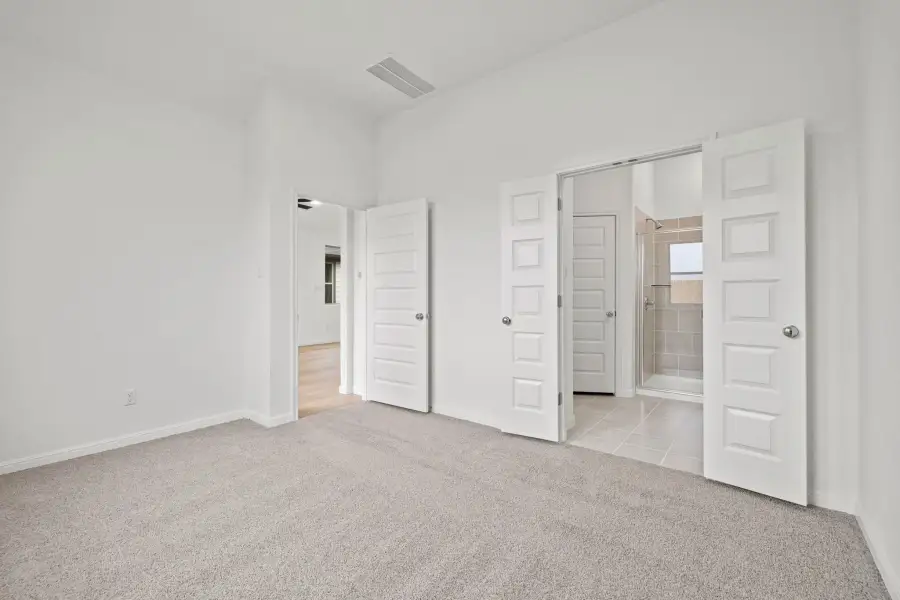 Primary Suite in the Birch home plan by Trophy Signature Homes – REPRESENTATIVE PHOTO