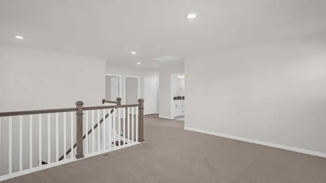 Spacious, unfurnished interior of a new home in The Estates Park, Apex (Image 25).