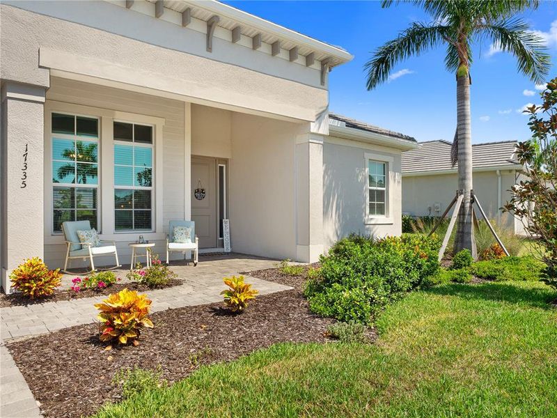Front exterior of a new home in , Venice, FL, highlighting curb appeal (Image 25). Front exterior of a new home in , Venice, FL, highlighting curb appeal (Image 25).