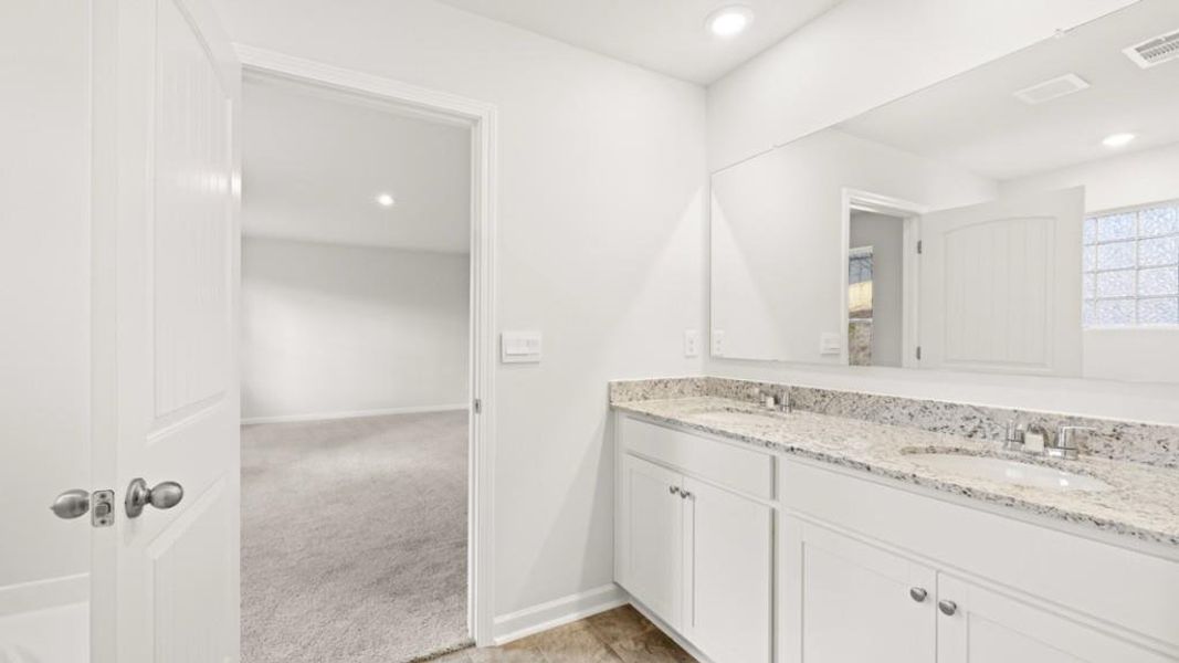 Furnished interior view inside a new home in Parkside at Carter Grove, Cartersville (Image 12).