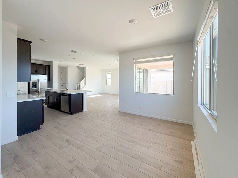 Dining into kitchen and great room Dining into kitchen and great room