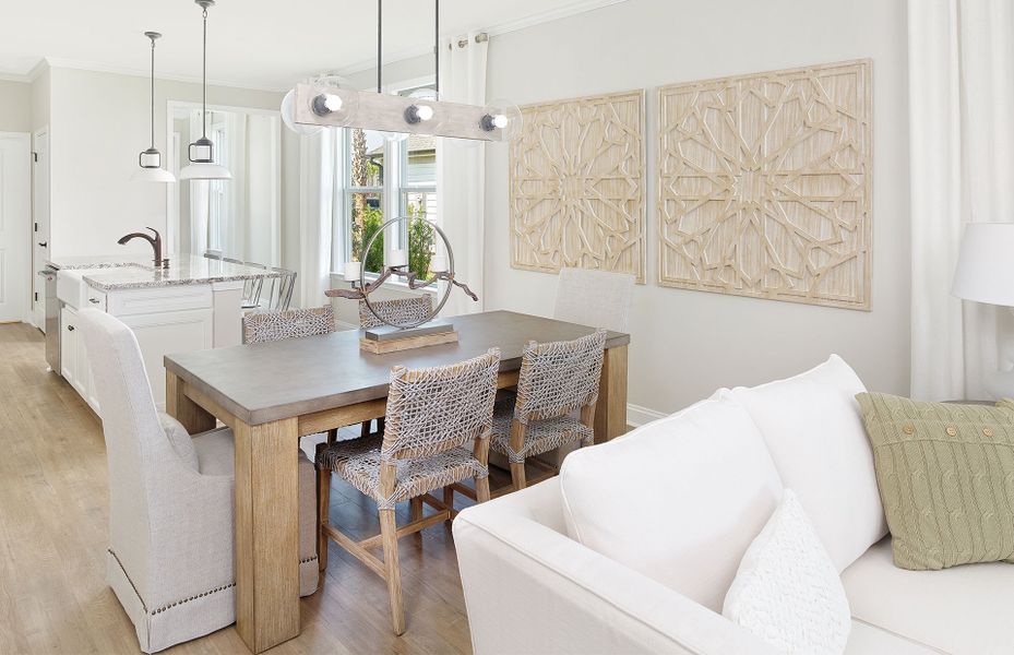 The dining area flows nicely into the kitchen and The dining area flows nicely into the kitchen and