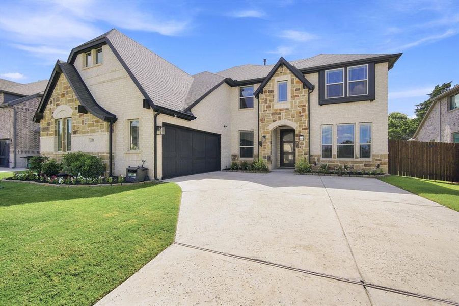 Front exterior of a new home in , Midlothian, TX, highlighting curb appeal (Image 22). Front exterior of a new home in , Midlothian, TX, highlighting curb appeal (Image 22).