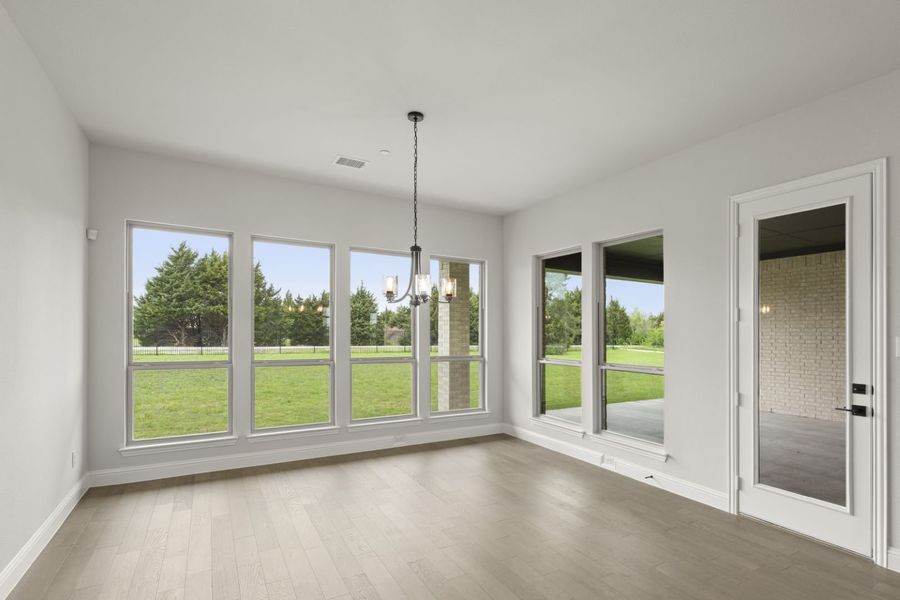Representative unfurnished interior of a home built from the Southport by Windsor Homes in Ridge Pointe Estates, McLendon-Chisholm (Image 24).