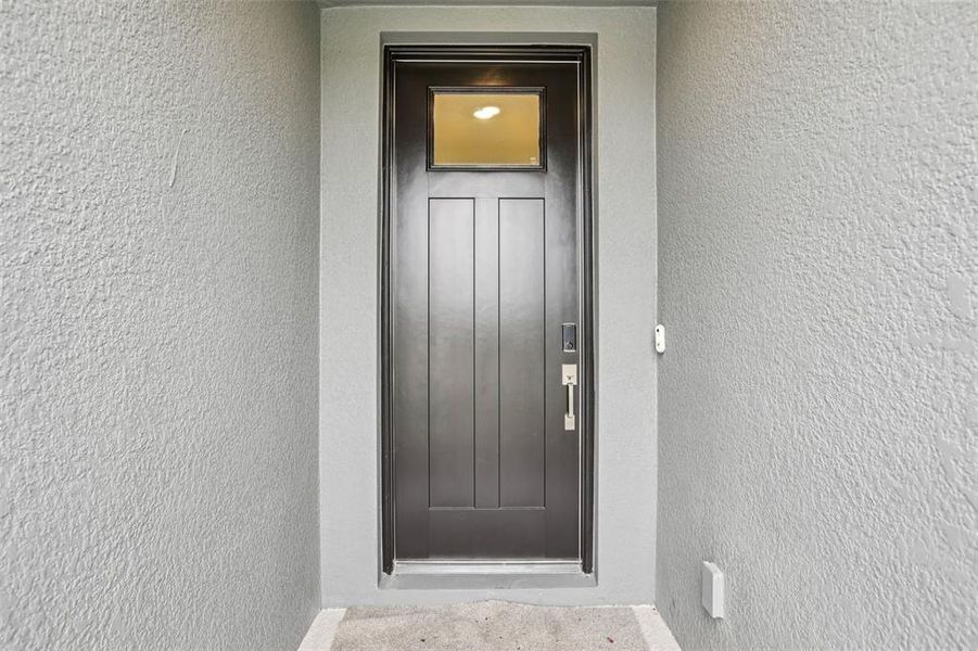 Exterior details and patio area of a home in Two Rivers - Classic Series, Zephyrhills (Image 24).