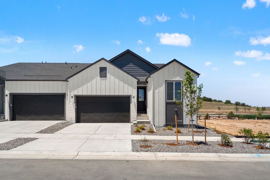 Front exterior of a new home in Trumark Homes at Tanterra, Parker, CO, highlighting curb appeal (Image 20). Front exterior of a new home in Trumark Homes at Tanterra, Parker, CO, highlighting curb appeal (Image 20).