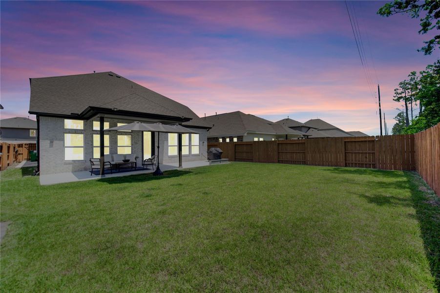 Enjoy the humongous back yard with high fences and no back neighbors!