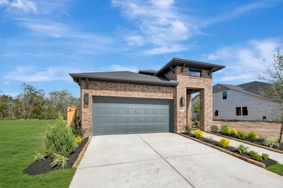 Front exterior of a new home in Sienna - Grove Collection, Missouri City, TX, highlighting curb appeal (Image 29).