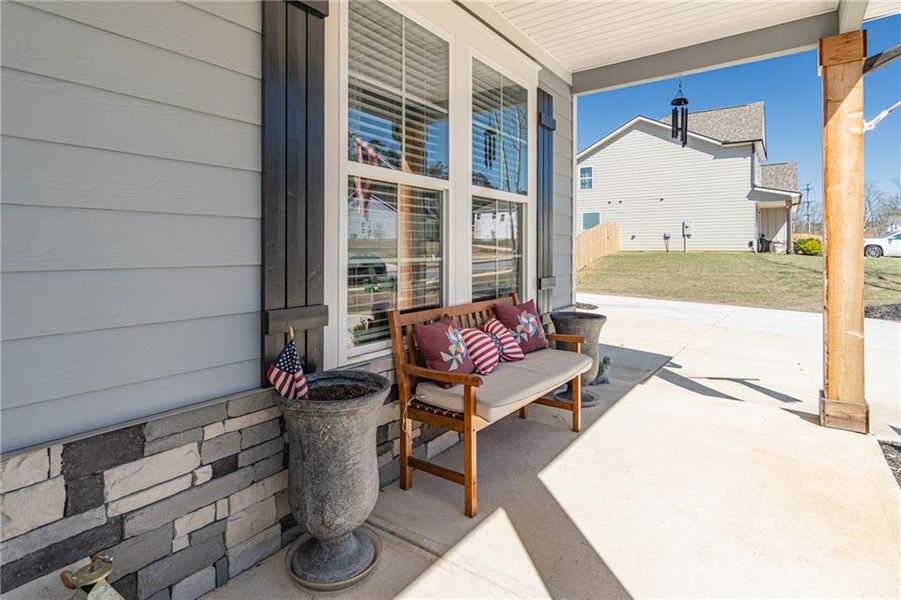 Exterior details and patio area of a home in River Station, Monroe (Image 27).