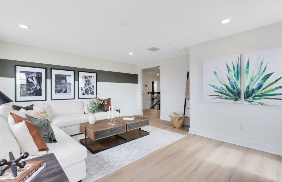 Representative furnished interior of a home built from the Serena by Pulte Homes in The Grow, Orlando (Image 11).