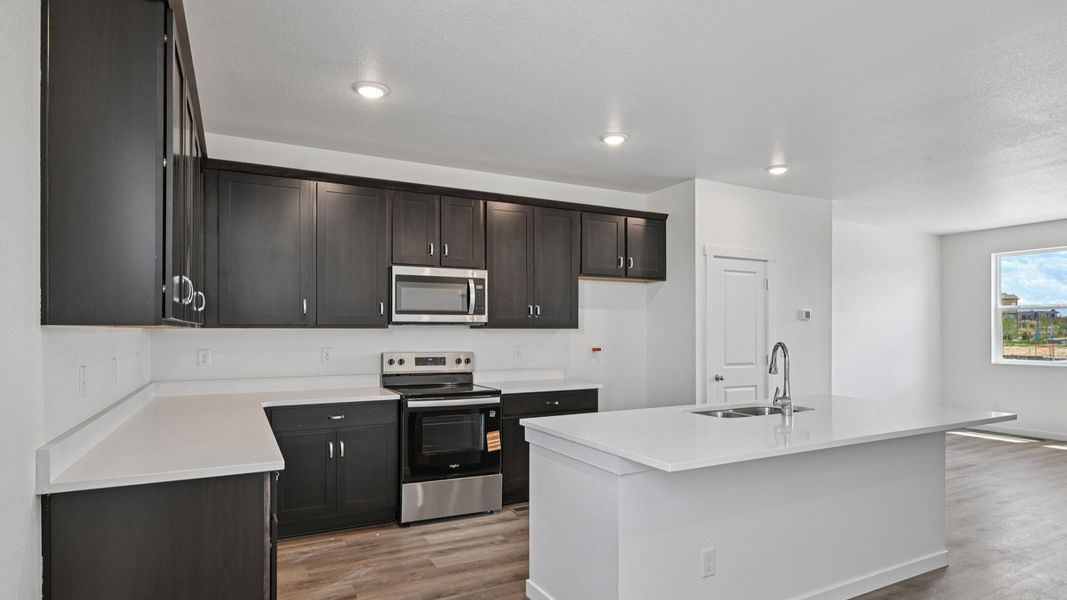 Furnished interior view inside a new home in Windler Townhomes, Aurora (Image 25). Furnished interior view inside a new home in Windler Townhomes, Aurora (Image 25).