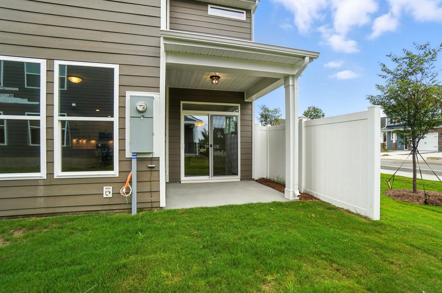 Front exterior of a new home in Harrisburg Village Townhomes, Harrisburg, NC, highlighting curb appeal (Image 32). Front exterior of a new home in Harrisburg Village Townhomes, Harrisburg, NC, highlighting curb appeal (Image 32).